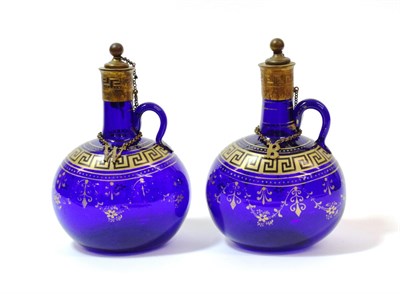Lot 1008 - A Pair of Gilt Metal Mounted Blue Glass Flagons, late 18th century, of flattened ovoid form...