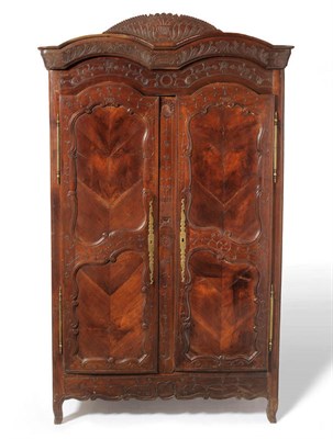 Lot 1377 - An 18th Century French Cherrywood Armoire, with carved inscription FAIT PARGUY DELABROSSE 1800, the