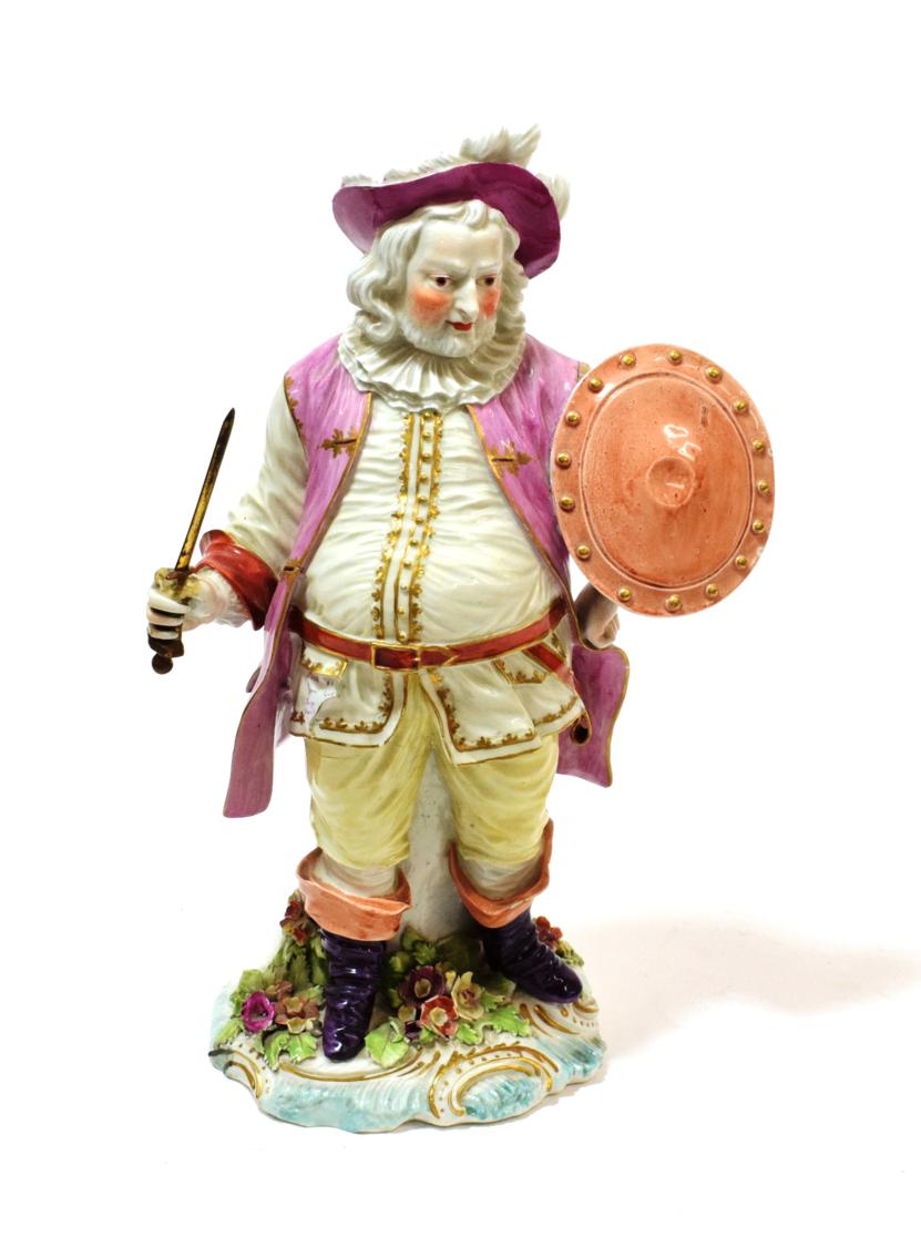 Lot 1029 - ^ A Derby Porcelain Figure of Falstaff, circa 1775, standing holding a sword in one hand, his...