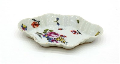 Lot 1033 - An English Decorated Chinese Porcelain Spoon Tray, circa 1750, of fluted rounded rectangular...