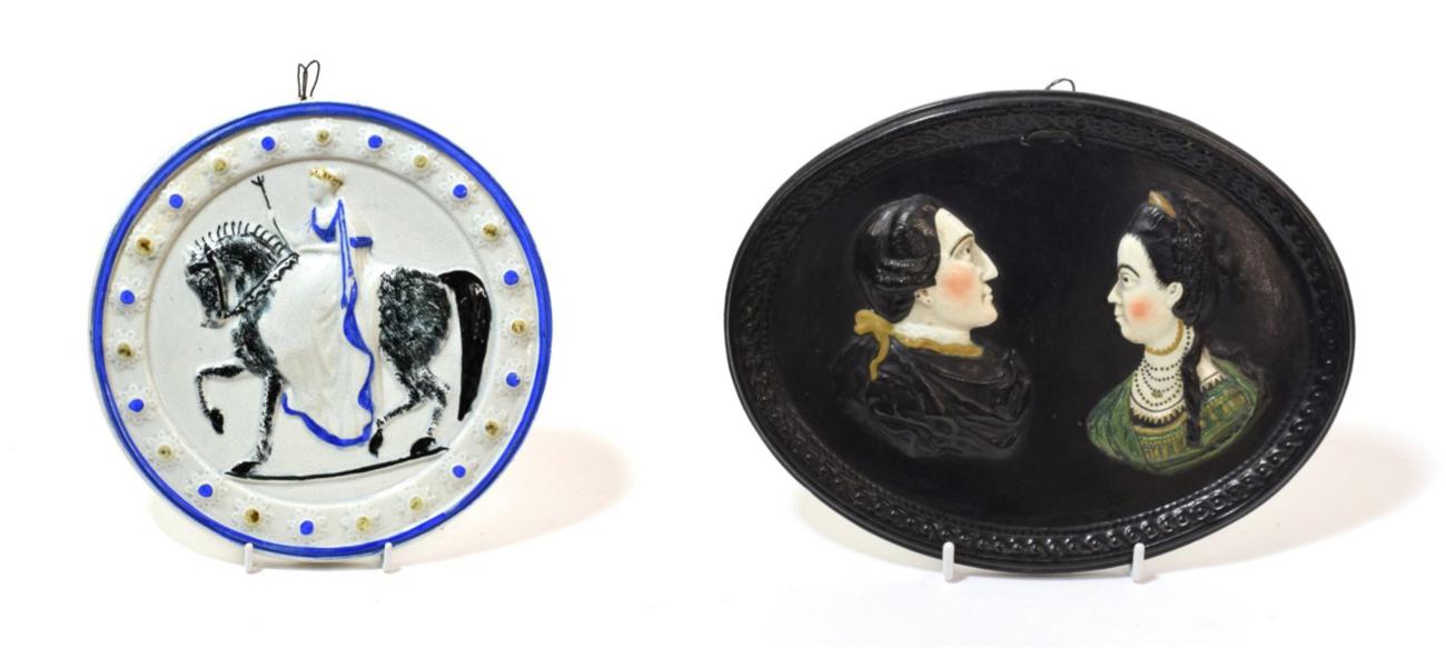 Lot 1037 - ^ A Pearlware Portrait Plaque, circa 1780, moulded and painted with bust portraits of a lady...