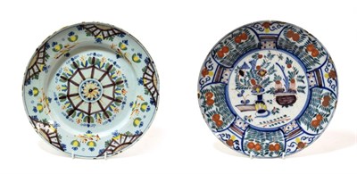 Lot 1039 - ^ A London Delft Dish, of Ann Gomm type, circa 1760, painted in colours with a central roundel...