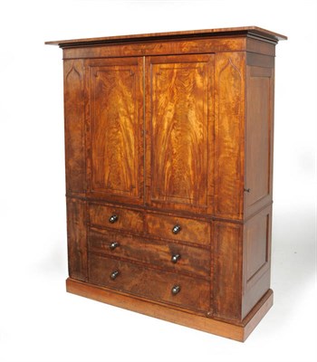 Lot 1380 - A Mahogany Linen Press, in the manner of Gillows, 2nd quarter 19th century, the bold pediment above