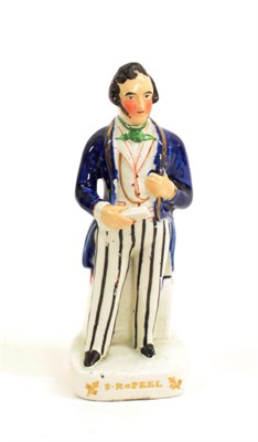 Lot 1056 - A Staffordshire Pottery Figure of Sir Robert Peel, mid 19th century, in striped trousers, 18cm high
