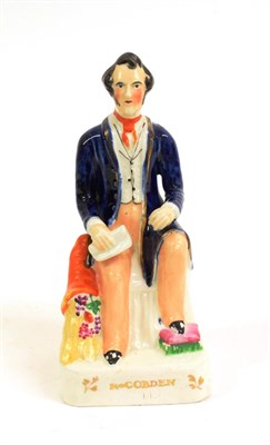 Lot 1057 - A Staffordshire Pottery Figure of Richard Cobden, mid 19th century, seated, 20cm high