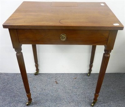 Lot 1382 - A George IV Mahogany Writing Table, 2nd quarter 19th century, with reeded edge and hinged...