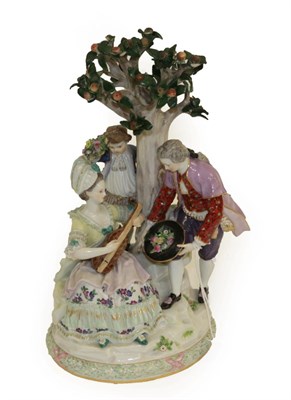 Lot 1069 - A Meissen Porcelain Figure Group, late 19th century, as a lady sitting playing the guitar, a...