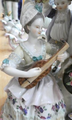 Lot 1069 - A Meissen Porcelain Figure Group, late 19th century, as a lady sitting playing the guitar, a...