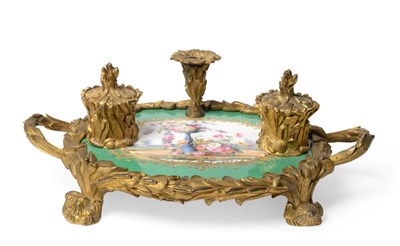 Lot 1071 - A French Napoleon III Porcelain and Ormolu Desk Stand, painted floral vignette within gilt...
