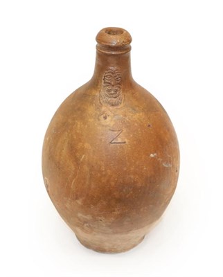 Lot 1074 - A German Stoneware Bellarmine, 17th century, of ovoid form with strap handle, the cylindrical...