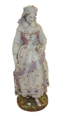 Lot 1081 - A Vion & Baury Bisque Porcelain Figure of a Maiden, late 19th century, dressed in Renaissance...