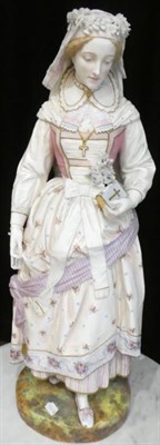 Lot 1081 - A Vion & Baury Bisque Porcelain Figure of a Maiden, late 19th century, dressed in Renaissance...