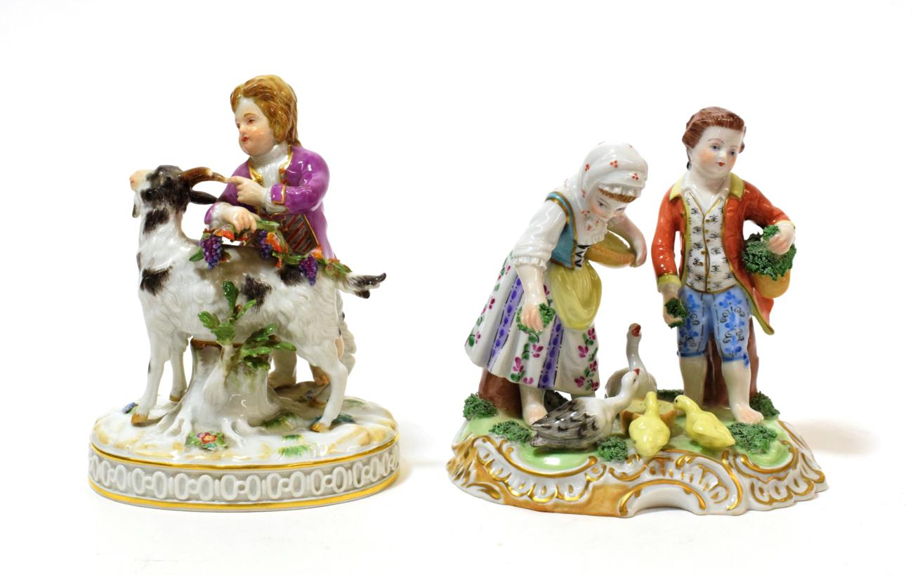 Lot 1083 - A Meissen Porcelain Figure of a Boy and Goat, 20th century, the boy holding fruiting vine on a...
