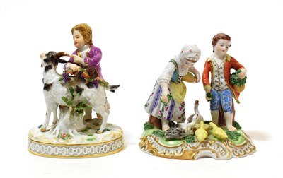 Lot 1083 - A Meissen Porcelain Figure of a Boy and Goat, 20th century, the boy holding fruiting vine on a...