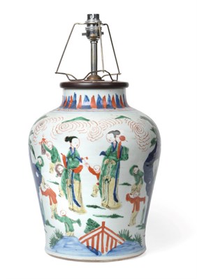 Lot 1090 - A Chinese Wucai Porcelain Baluster Jar, mid 17th century, painted with mothers and children in...