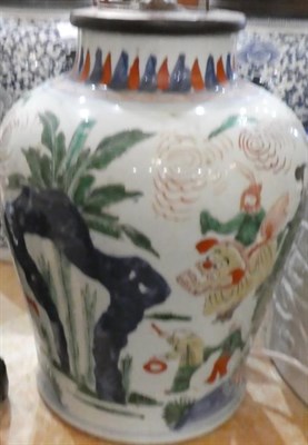 Lot 1090 - A Chinese Wucai Porcelain Baluster Jar, mid 17th century, painted with mothers and children in...