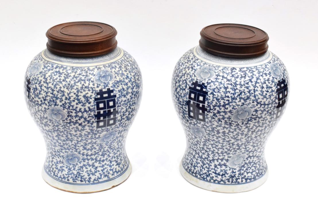 Lot 1091 - A Pair of Chinese Porcelain Baluster Jars, 19th century, painted in in underglaze blue with...