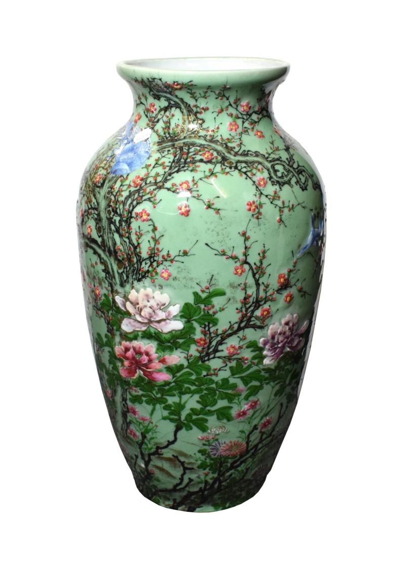 Lot 1094 - ^ A Japanese Porcelain Large Jar, Meiji period, moulded and painted with birds amongst...