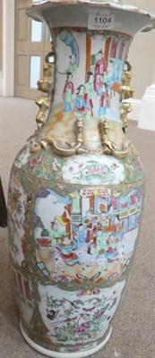 Lot 1104 - A Cantonese Porcelain Vase, mid 19th century, of baluster form with mythical beast handles,...
