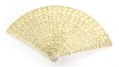 Lot 1110 - An Early 19th Century Chinese Carved Ivory Brisé Fan, the twenty-one inner sticks and two...