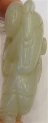 Lot 1120 - A Chinese Jade Figure, of a boy carrying a flower over his shoulder, 6.5cm high See illustration