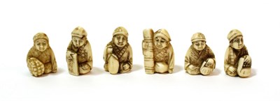 Lot 1132 - A Set of Six Japanese Ivory Netsukes, Meiji period, each as a seated figure holding various...