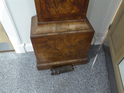 Lot 1138 - ~ A Walnut Longcase Clock, arched pediment, trunk and base with well figured veneers and...
