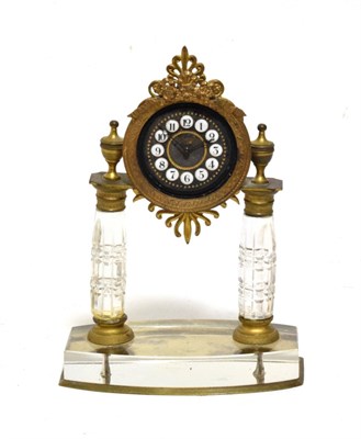 Lot 1159 - An Austrian Rock Crystal Portico Mantel Timepiece, portico case with cut glass columns and...