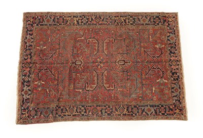 Lot 1180 - Heriz Carpet Iranian Azerbaijan, circa 1920 The abrashed field of angular vines enclosed by...