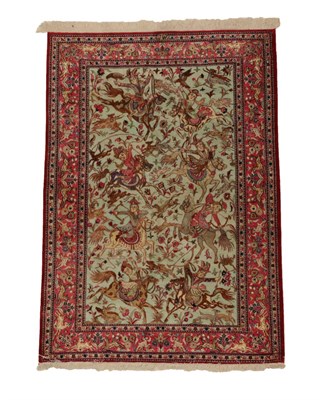 Lot 1181 - Ghom Silk Rug Central Iran, late 20th century The ice blue ground depicting a hunting scene...