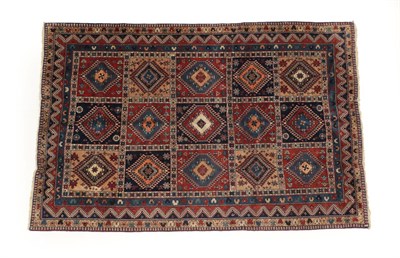 Lot 1198 - Yalameh Carpet South Iran, modern The polychrome compartmentalised field of hooked güls...