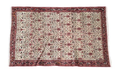 Lot 1204 - Afshar Rug South East Iran, circa 1960 The ivory field with a one-way design of stylised trees...