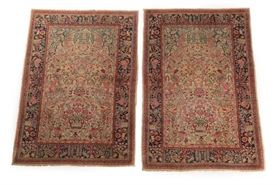 Lot 1207 - Pair of Kashan Prayer Rugs Central Iran, circa 1930 Each with an ivory field and urn issuing...