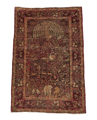 Lot 1209 - Good Pair of Kirman Pictorial Rugs South East Iran, circa 1900 Each with a peacock above trees,...
