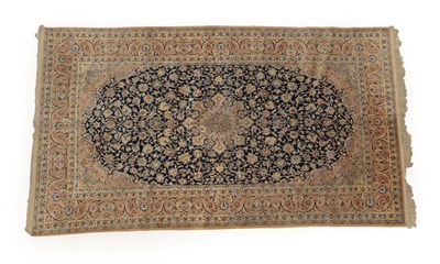 Lot 1213 - Nain Wool Carpet Central Iran, 3rd quarter 20th century Woven with floral medallions, mainly in...