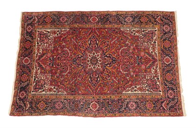 Lot 1226 - Ahar Heriz Carpet Iranian Azerbaijan, circa 1950 The strawberry field with flower head...