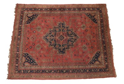 Lot 1241 - Ushak Carpet Central/West Anatolia, circa 1920 The soft brick field of angular motifs around a...