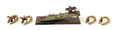 Lot 1261 - A Cold Painted Bronze Hunting Themed Desk Letter Holder, early 20th century, modelled as a huntsman