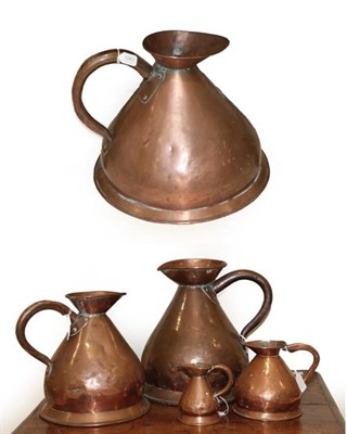 Lot 1267 - A Collection of Five Various Copper Haystack Measures, 19th century
