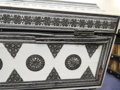 Lot 1271 - A Vizagapatam Ivory, Ebony and Sadeli Work Box, mid 19th century, of sarcophagus form with...