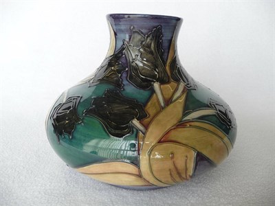 Lot 1412 - A William John Moorcroft "Tulip" Baluster Vase, designed by Sally Tuffin, in the black...