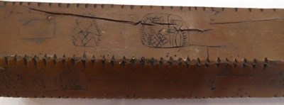 Lot 1280 - A Carved Wooden Hexagonal Staff, possibly a Runic or Clog Almanac, engraved with various...