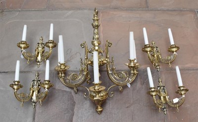 Lot 1289 - A Brass Six-Light Chandelier, in 17th century style, the fluted knopped column and scroll...