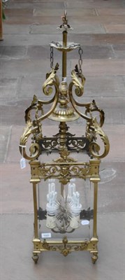 Lot 1293 - A Victorian Brass Lantern, of square section, with scroll supports and cast and pierced scroll...