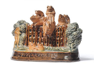 Lot 1415 - A Doulton Lambeth Stoneware "STEEPLE CHASE" Mouse Group, by George Tinworth, with frogs riding mice