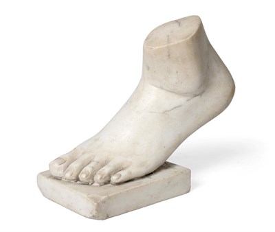 Lot 1318 - An Italian Marble Model of a Foot, in Grand Tour style, on a rectangular base, 29cm long See...