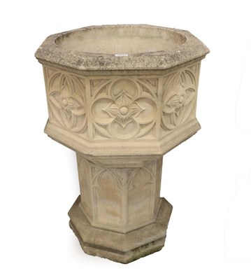 Lot 1333 - A Cast Stone Planter, in the form of a gothic font, of hexagonal form with rosettes in roundels, on