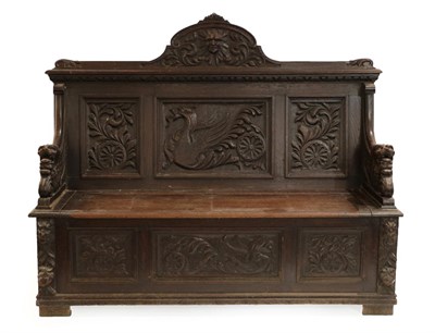 Lot 1371 - A Victorian Carved Oak Hall Bench, 3rd quarter 19th century, the back support with a scrolled...