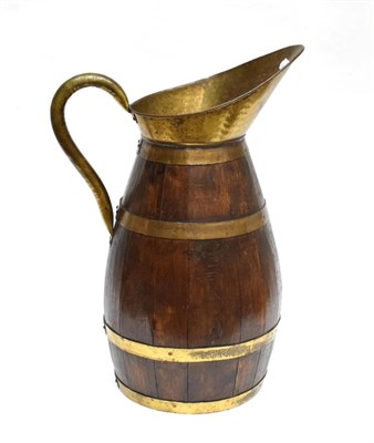 Lot 1375 - A Brass Bound Coopered Jug, late 19th/early 20th century, of barrel form with loop handle, 59cm...