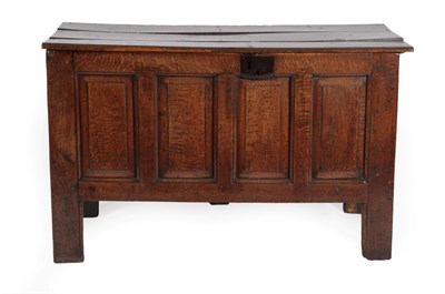 Lot 1382 - ^ An Early 18th Century Joined Oak Chest, the three-plank hinged lid above an iron lockplate...